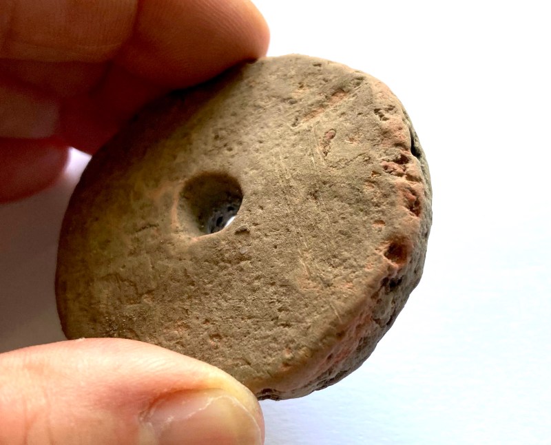 308-S75: Prehistoric re-use of broken pottery for an Iron Age spinning whorl (in Dutch spintol) on loan from The Hague Archeology.