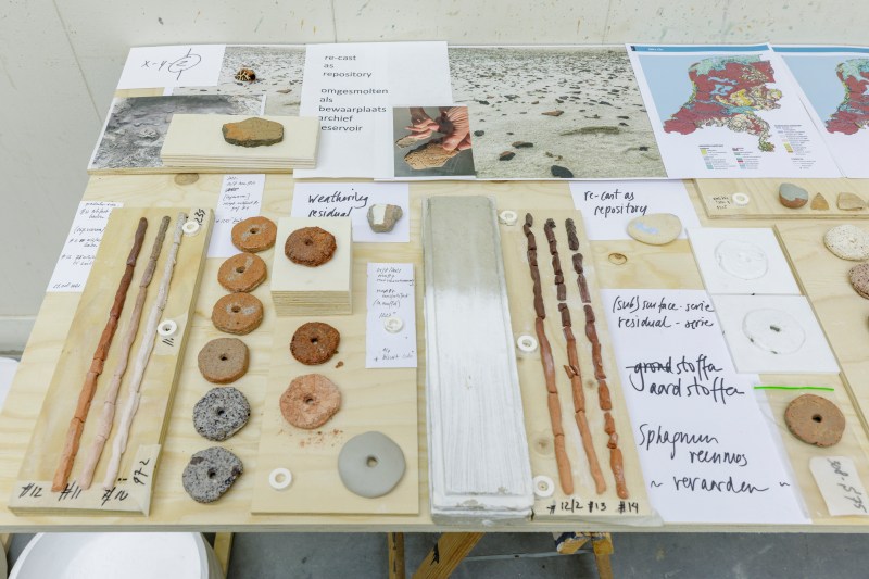 work-in-progress with Iron Age archeology artifacts, testing, salt, in-between matter and shapes, images and words. Photo: Luuk Smits.