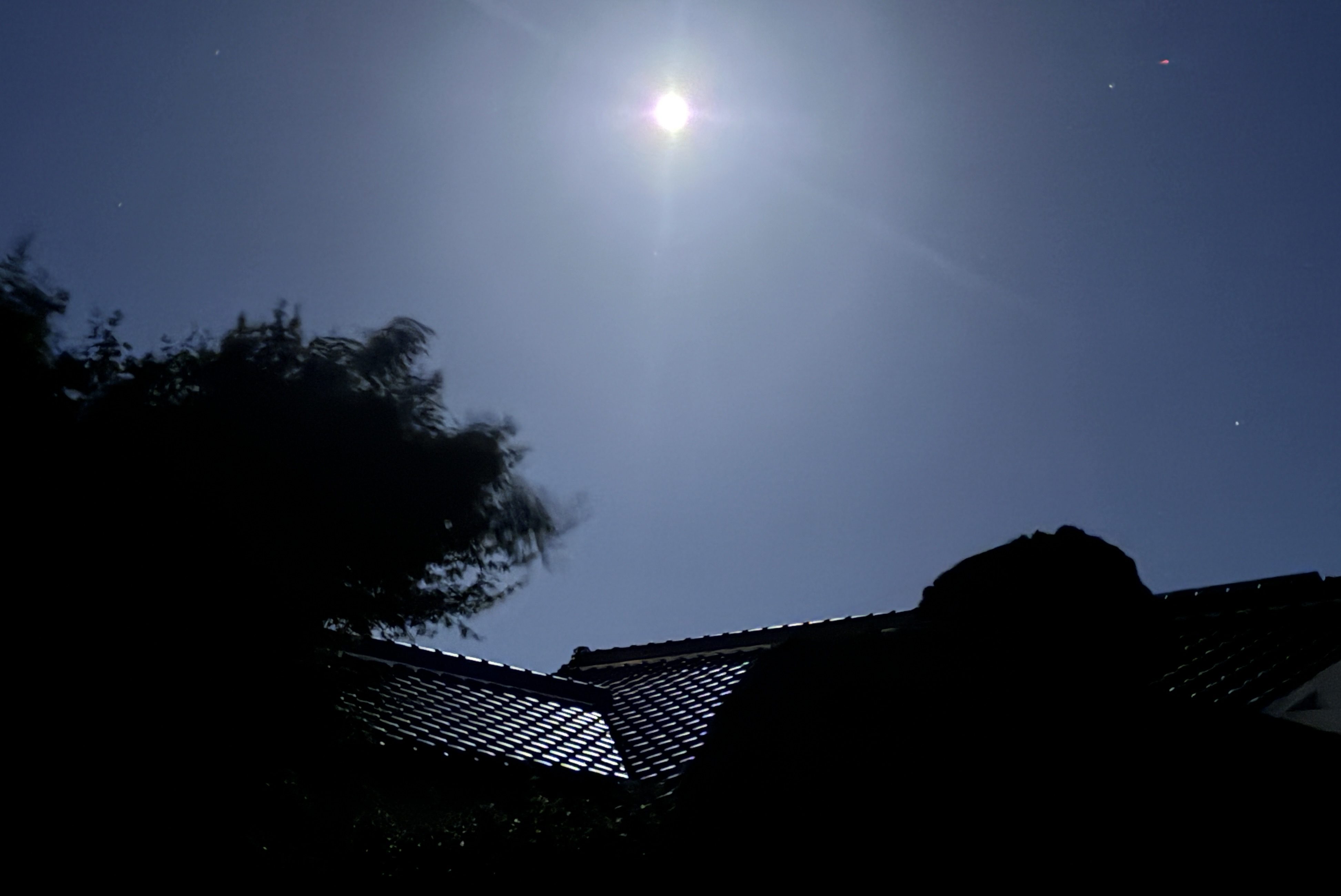 Blue Moon illuminates roof tiles, May 31, 2026 in Japan